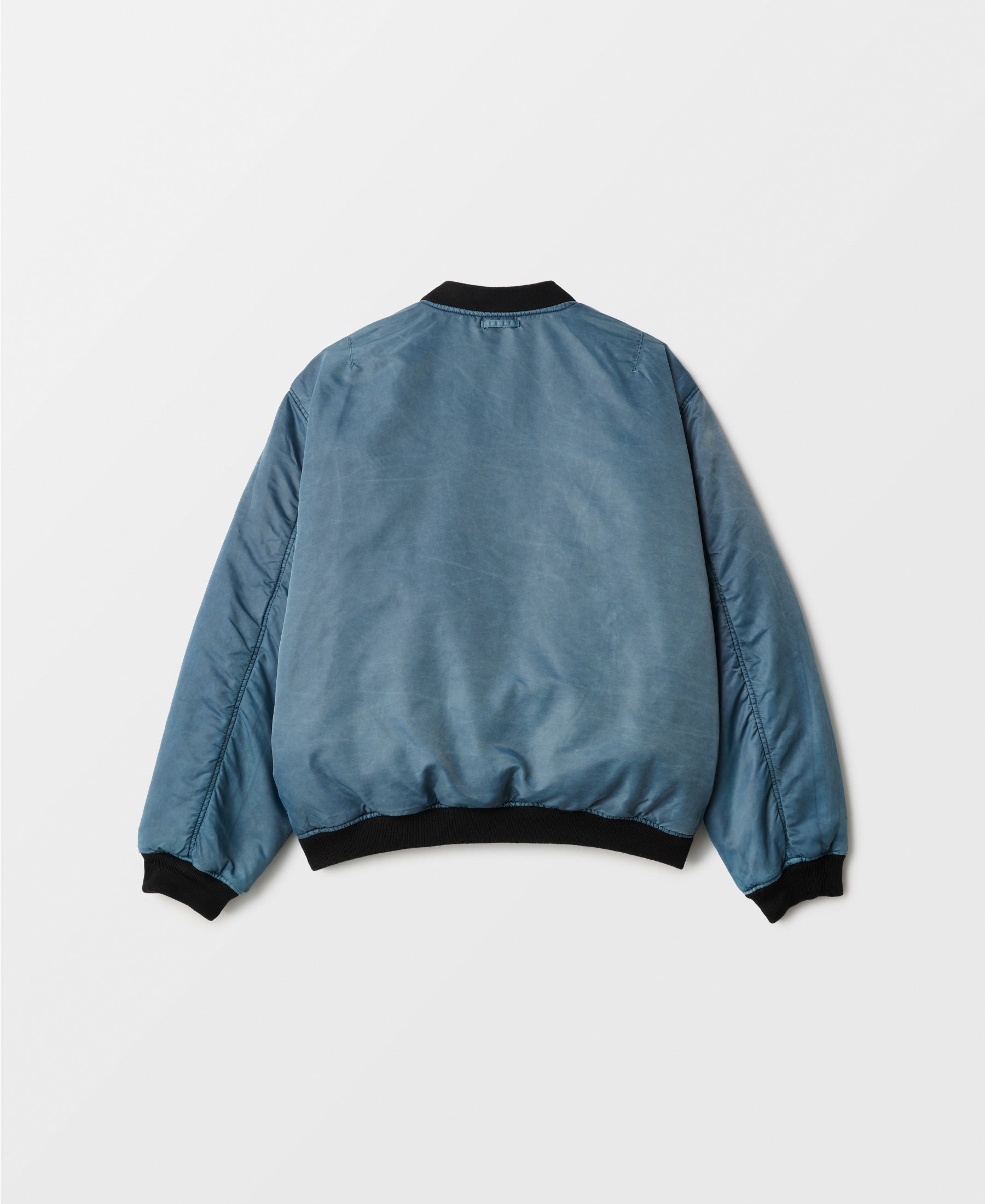 GARMENT-DYE NYLON BOMBER JACKET - BLUE X BROWN