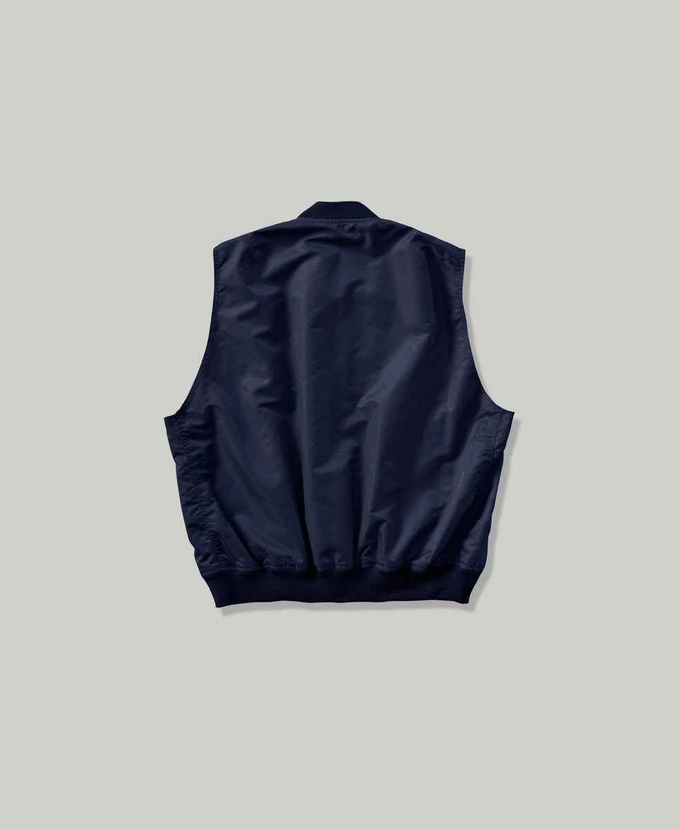 NON-PADDED SLEEVE-LESS BOMBER JACKET | VINTAGE WASH NAVY – F.M.C.D ...